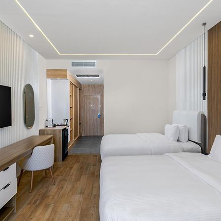 Bellagio Beach Resort&Spa Hurghada Esterno foto A room at the hotel