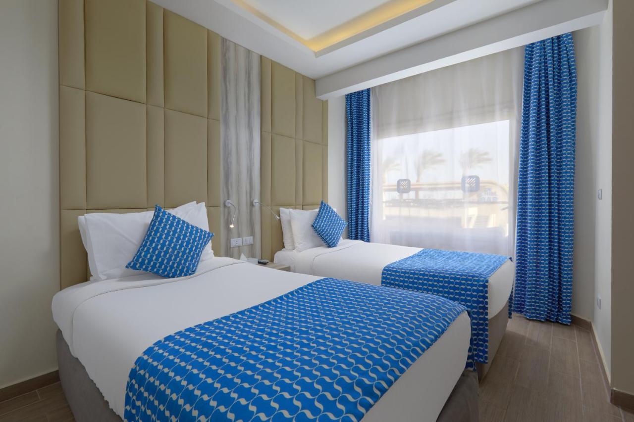 Bellagio Beach Resort&Spa Hurghada Esterno foto A room at the hotel